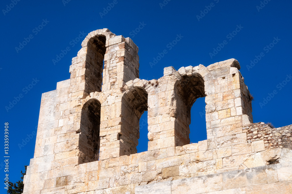 An artistic shot of ancient stone ruins set against a vibrant blue sky, inviting reflections on time, history, and the passage of human civilization. An artistic shot of ancient stone ruins set against a vibrant blue sky, inviting reflections on time, history, and the passage of human civilization.
