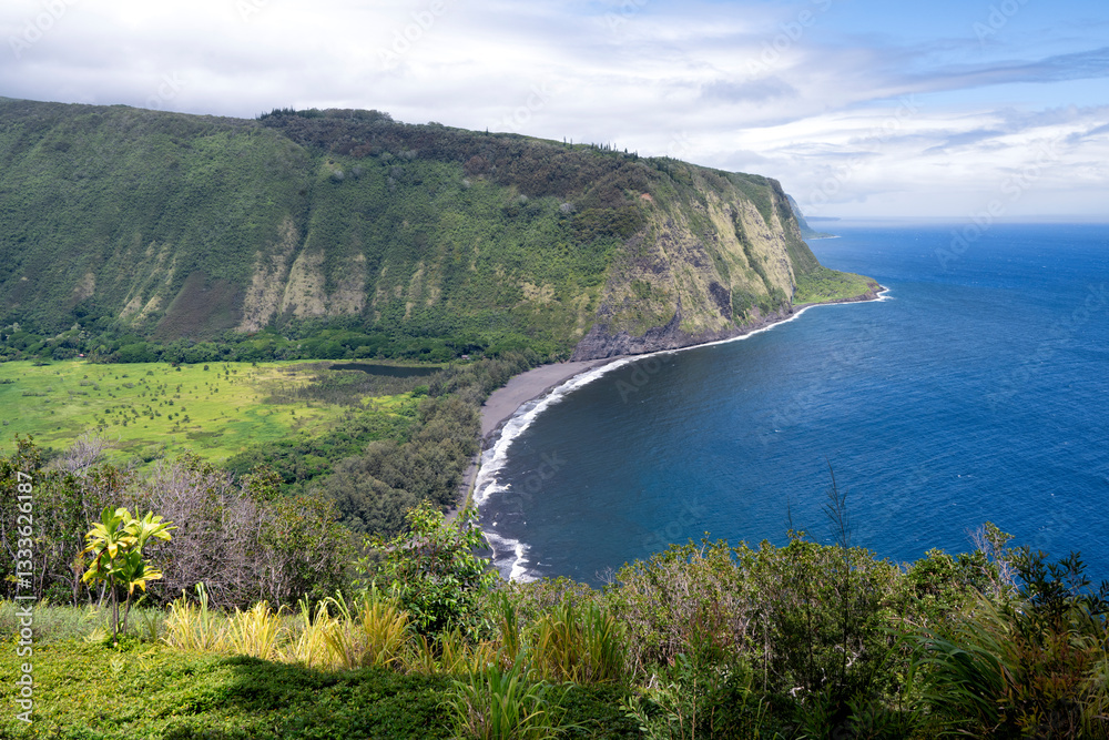 Fototapeta premium A captivating view of coastal cliffs paired with lush green valleys showcases the raw beauty of nature, inviting viewers to explore its serene coastline.