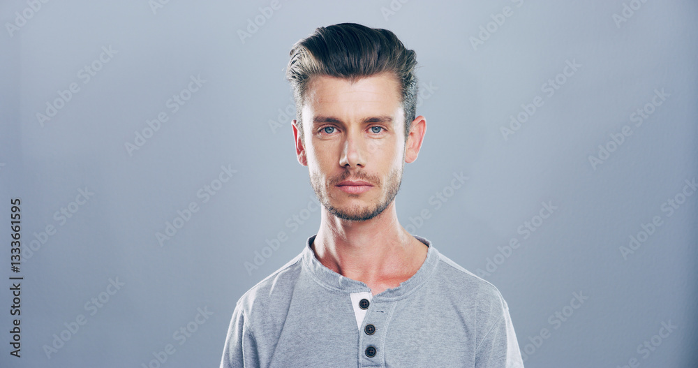 Fototapeta premium Confident, serious and portrait of man, studio and graphic designer with ambition for career or freelancer. Mockup space, blue background and calm for web design in creative company, proud and USA