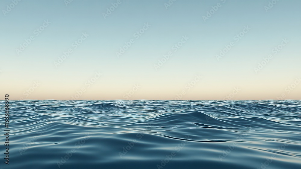 Obraz premium Gentle ocean waves ripple beneath a calm, clear sky, creating a serene and tranquil seascape.