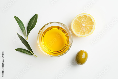 Obraz na płótnie Olive Oil with Fresh Olive Leaves and Lemon on White Background
w salonie