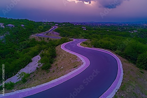 Winding Purple Road at Twilight Aerial View