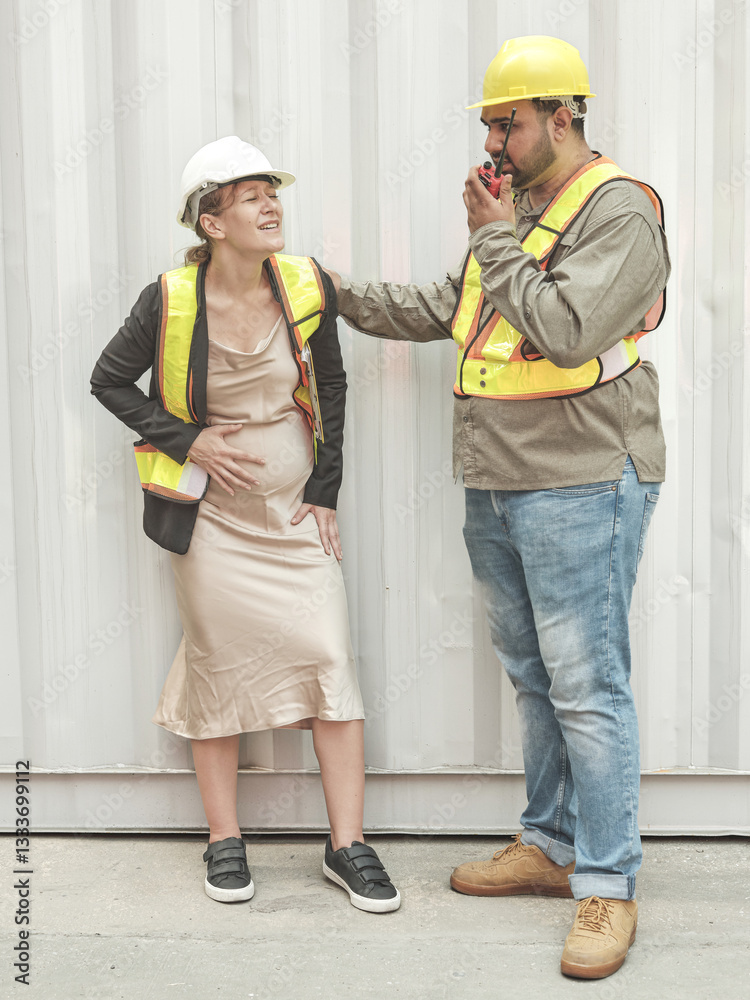 Pregnant female worker struggles in container yard and gets help from walkie-talkie in emergency