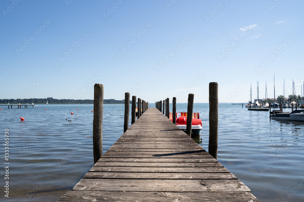 Wooden pier in the lake Wooden pier in the lake