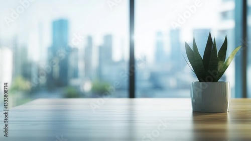 Minimalist office desk with natural light, blurred cityscape outside; simplicity and focus in a modern workspace.

