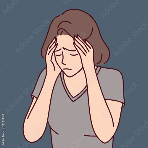 A young woman holding her head, showing signs of stress and headache. A concept of anxiety, fatigue, and mental health.