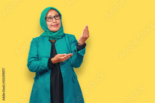 Elegant Muslim Woman in Green Hijab Posing