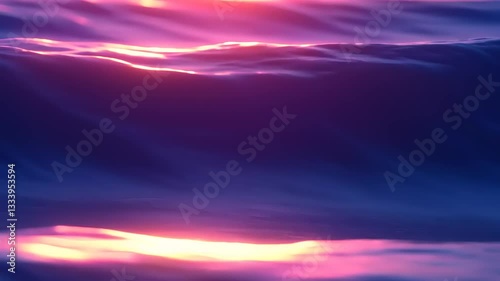 Serene sunset over gentle ocean waves reflecting vibrant colors in a tranquil seascape