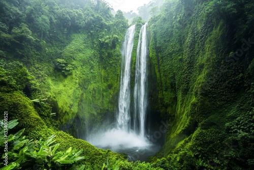 Serene Waterfall in Lush Green Tropical Paradise