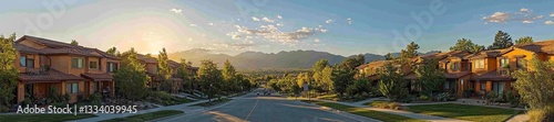 Panoramic view of a quiet suburban street with lush green trees mountains and residential homes at sunset. Generative AI photo