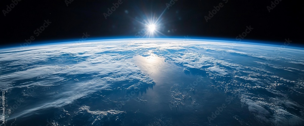 Spectacular View of Earth from Space with Bright Sunlight Reflection