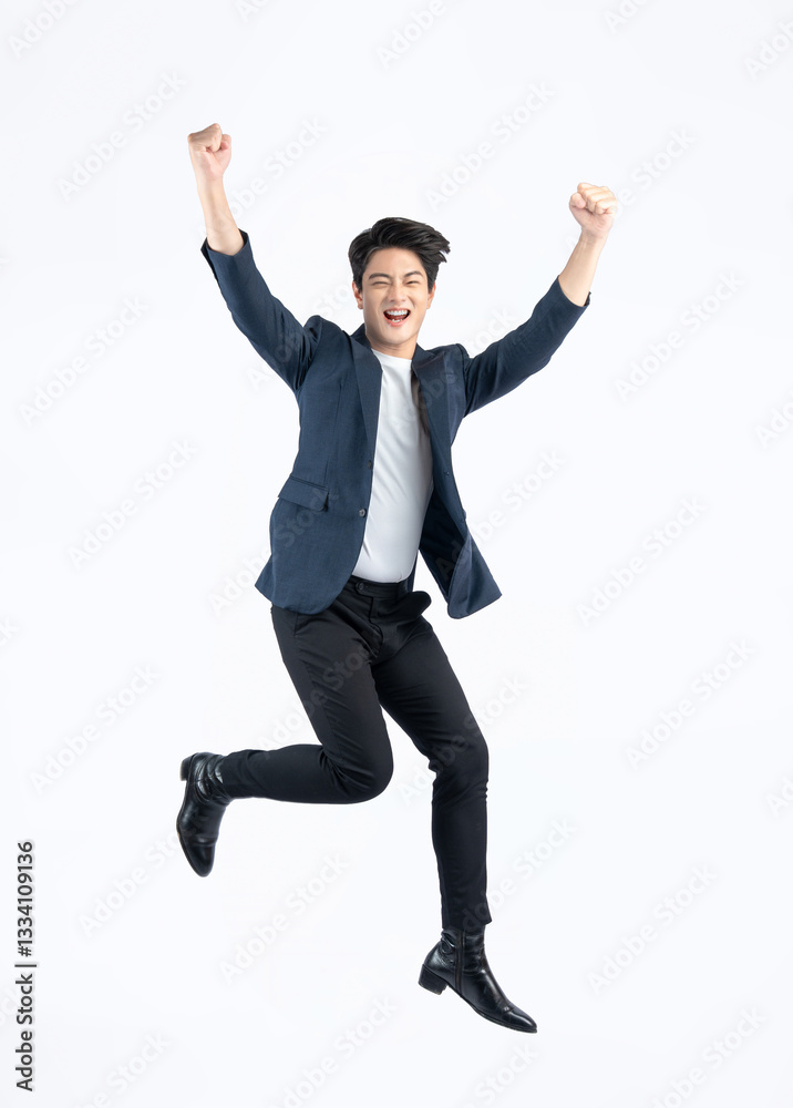 Full body image of a young Asian business man posing on a white background Full body image of a young Asian business man posing on a white background