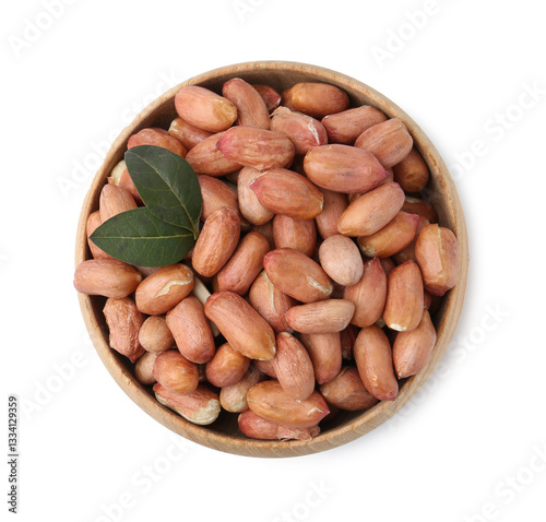 Fresh peanuts in bowl isolated on white, top view