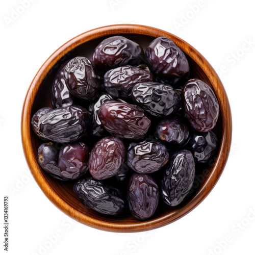 dried plums in a wooden bowl on transparent background