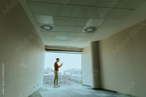 Man standing in a spacious ...