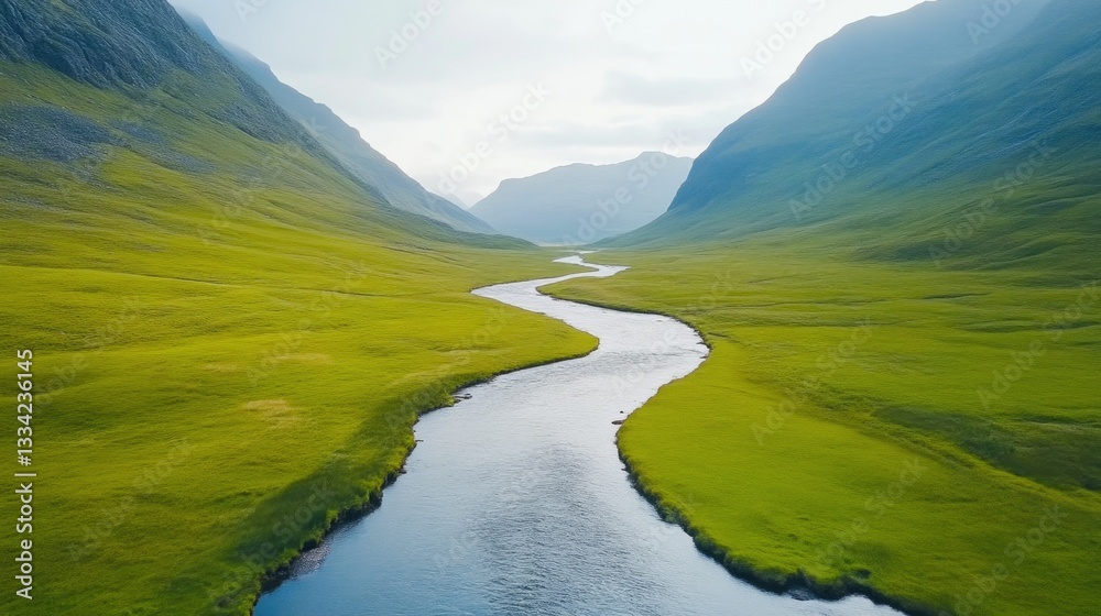 Fototapeta premium Aerial view of winding mountain stream