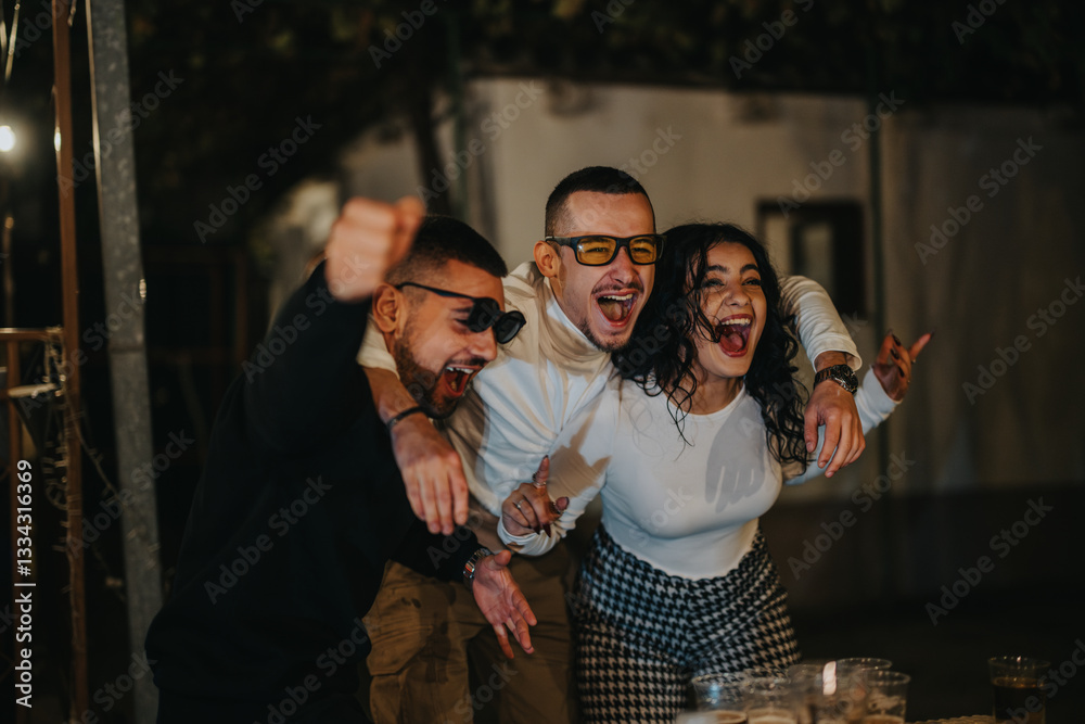 A cheerful group of friends enjoying a festive moment outdoors at night, displaying excitement and joy. A cheerful group of friends enjoying a festive moment outdoors at night, displaying excitement and joy.
