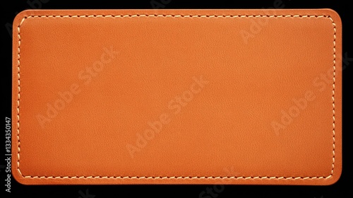 Orange leather patch, stitched edges, isolated background