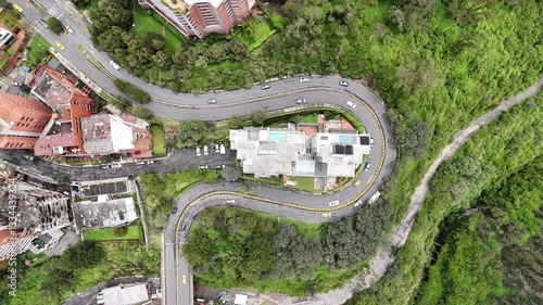 Aerial footage of the city Quito in Ecuador with the Volcan mountain on background