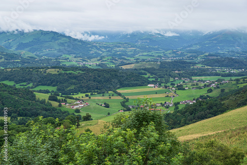 Fototapeta Naklejka Na Ścianę i Meble -  Rural landscape in the Pyrenees in France with fields, forest and mountains