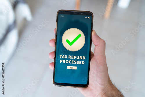 Tax refund processed notification on smart phone.