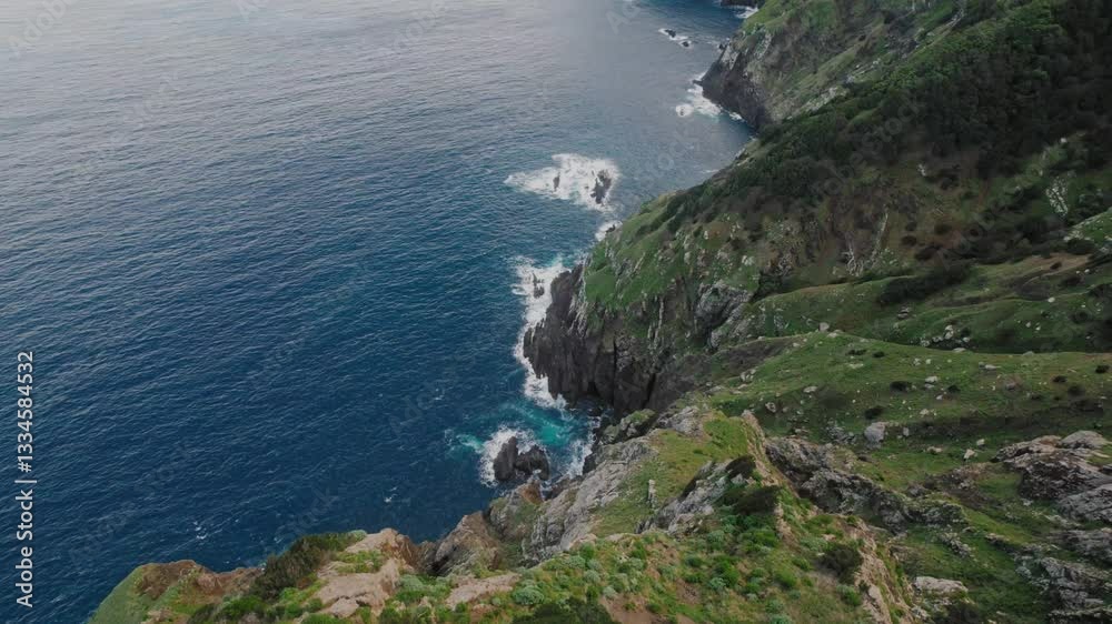 Drone view of the Atlantic ocean coast and the mountains of Madeira Drone view of the Atlantic ocean coast and the mountains of Madeira