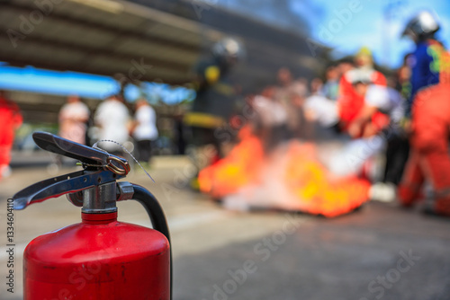 Company employees are undergoing basic fire extinguishing training, fire extinguisher use, safety week, fire prevention, loss prevention, photo