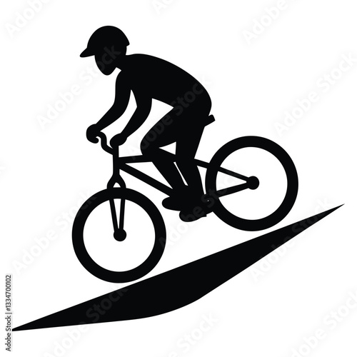 silhouette of a man riding a bike