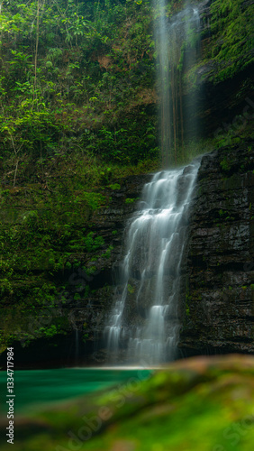 Vertical Shot of Marimbondo Waterfall Surrounded by Greenery
vertical shot, Marimbondo Waterfall, Brazil, Chapada dos Guimarães, silky water, long exposure, nature, ND filter, waterfall phot