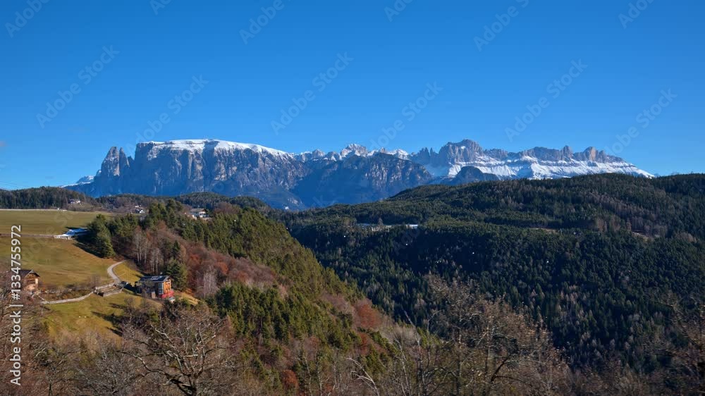 Distant view of snow on the mountains in the Dolomites, Italy Distant view of snow on the mountains in the Dolomites, Italy