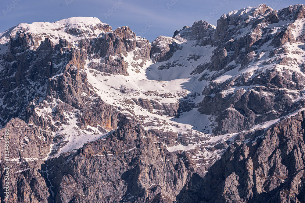 Fototapeta premium White peaks. White peaks, but not much. Climate change means that snow accumulation is becoming scarce where just a few years ago there were perpetual snowfields.