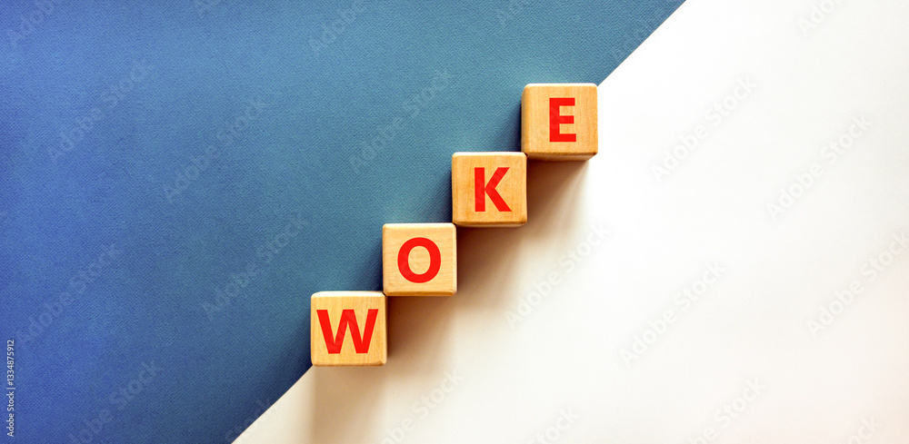 Obraz premium Woke question symbol. Concept word Woke question on beautiful wooden blocks. Beautiful white and blue background. Business, lifestyle, support and woke question concept. Copy space.