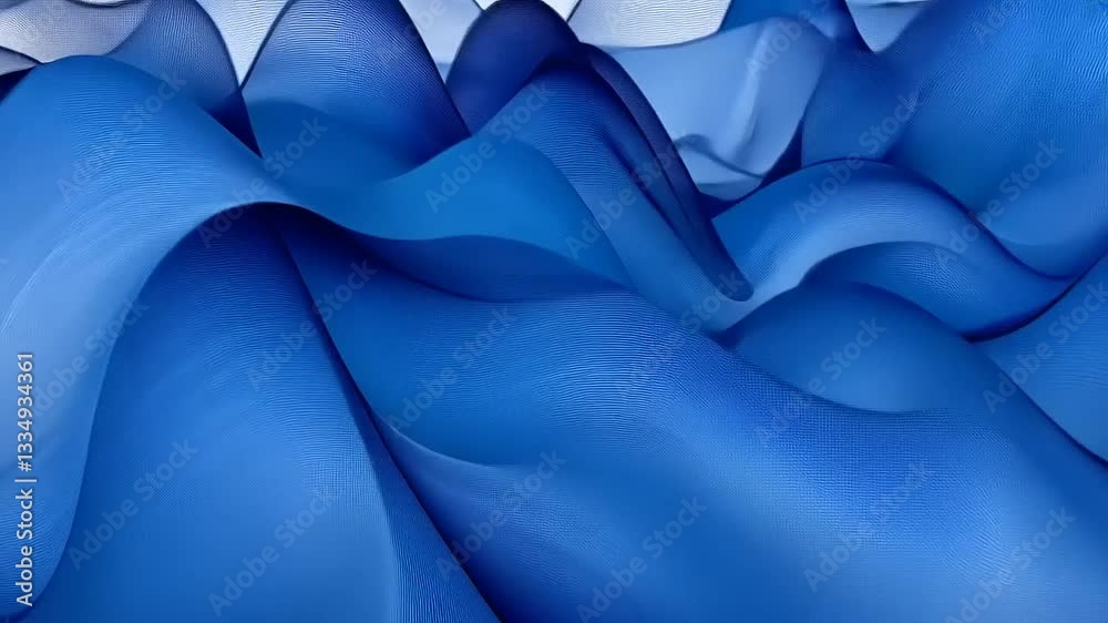 Abstract waves of blue fabric flowing gracefully in a serene atmosphere, evoking calm and tranquility