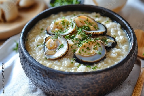 Abalone soup with rice porridge photo
