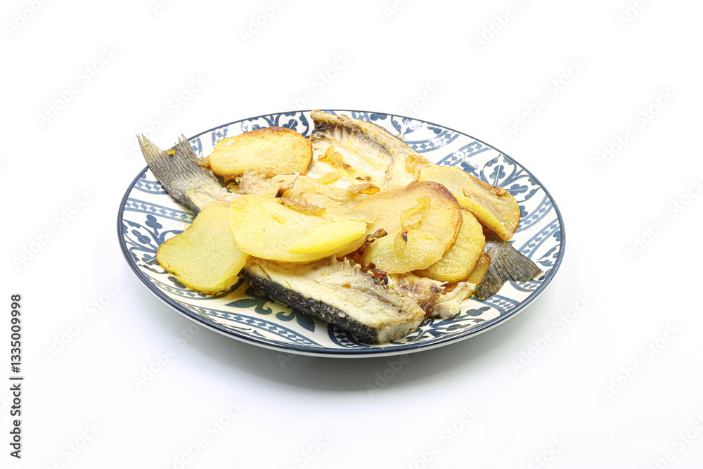 Baked fish dish with potatoes. Baked fish dish with potatoes.