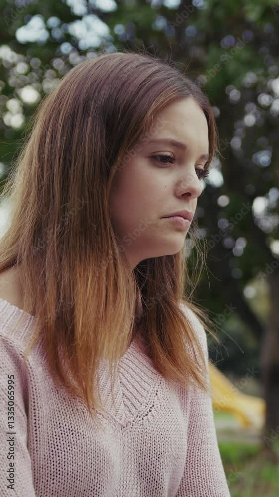 Sad And Lonely Girl Sitting In Park Bench Outdoors Sad And Lonely Girl Sitting In Park Bench Outdoors