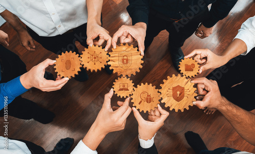 A diverse business team showcases their collective efforts in security strategies by holding wooden gears, symbolizing collaboration and innovation within corporate environments. Amity