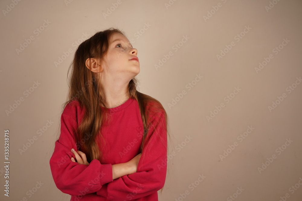 A red-haired girl stands with her arms crossed, exuding confidence and elegance. Her composed posture highlights her strong presence. The bright setting frames her striking features. A red-haired girl stands with her arms crossed, exuding confidence and elegance. Her composed posture highlights her strong presence. The bright setting frames her striking features.
