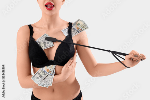 Young prostitute with whip ...