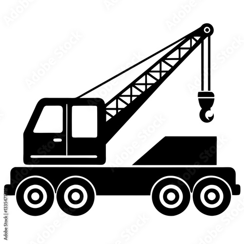 A yellow construction crane and truck with heavy equipment for transportation and lifting in an industrial setting