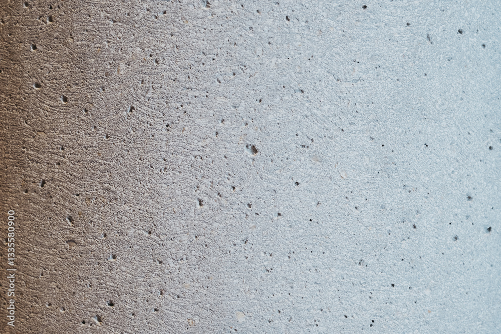 Fototapeta premium Textured surface with a subtle color gradient showcasing a raw and natural aesthetic Great for backgrounds and textures
