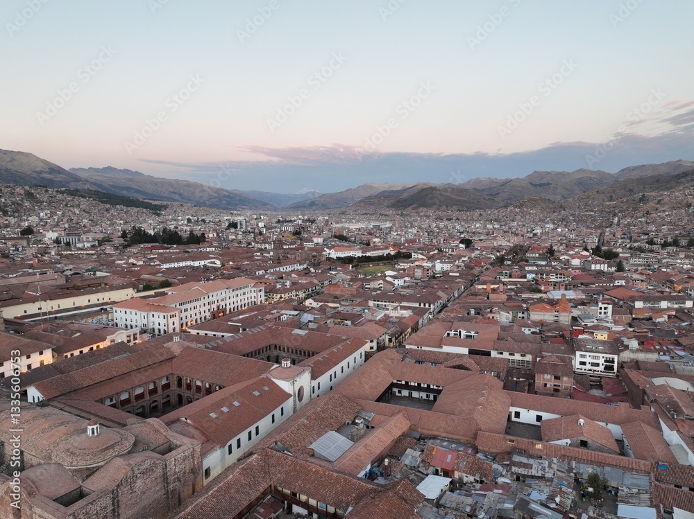 Cusco rooftops stretch to the Andes Mountains