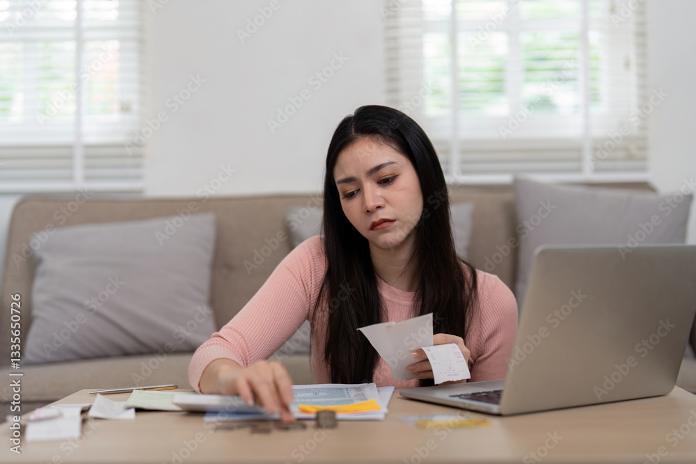 Organization and Focus in Financial Planning. A determined woman sorting through bills, signifying the importance of organization in achieving financial goals. Organization and Focus in Financial Planning. A determined woman sorting through bills, signifying the importance of organization in achieving financial goals.