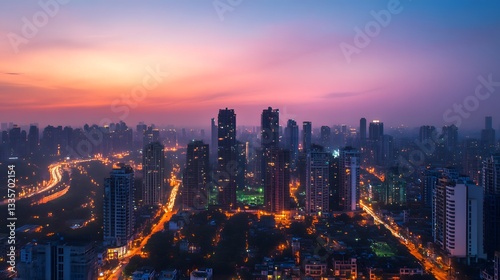 Wallpaper Mural A city skyline at dusk with a beautiful orange and pink sky. The city is lit up with lights, creating a warm and inviting atmosphere Torontodigital.ca