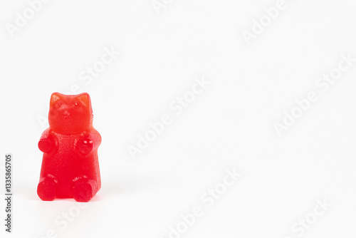 Homemade red gummy bear candy isolated on white background photo