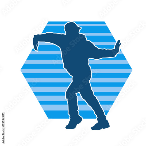 Silhouette of a slim man dancing pose. Silhouette of a male dancer in action pose.