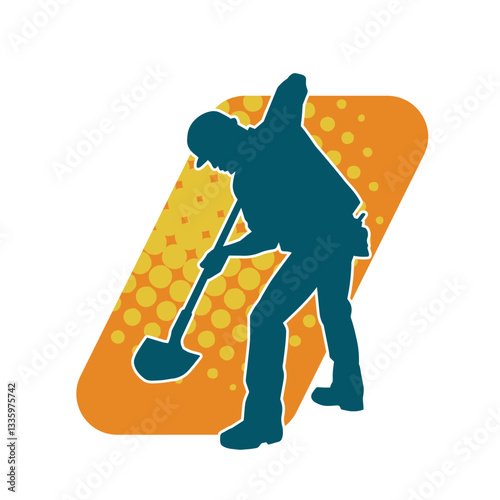 Silhouette of a worker carrying shovel tool. Silhouette of a worker in action pose using shovel tool.