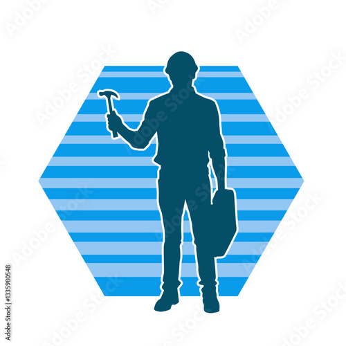 Silhouette of a worker carrying hammer tool. Silhouette of a worker in action pose using hammer tool.