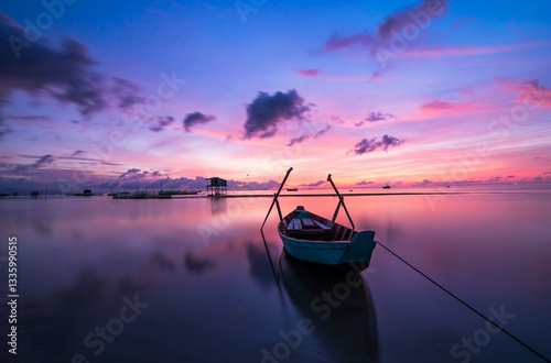 Fototapeta Naklejka Na Ścianę i Meble -  fishing boat at sunset