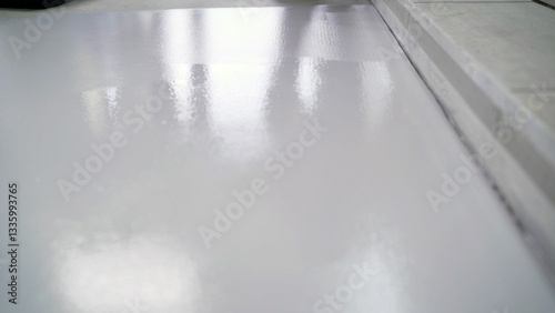 Принти на полотні Epoxy resin floor drying: reflecting lights on wet surface